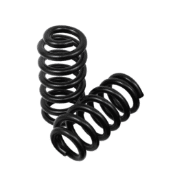 Two black metal coil springs, one standing upright and the other leaning against it.